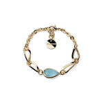 Bracciale con Elementi e Pietra Centrale Azzurra a Cabochon e Pendente Logo Unoaerre