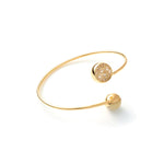 Bracciale Rigido Contrarié in Argento Dorato con Sfere con Pavé Unoaerre