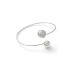 Bracciale Rigido Contrarié in Argento Rodiato con Sfere Impreziosito da Pavé Unoaerre