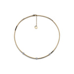 Collana in Argento Dorato con Tubo Zigrinato ed Elementi Ovali con Zirconi Unoaerre