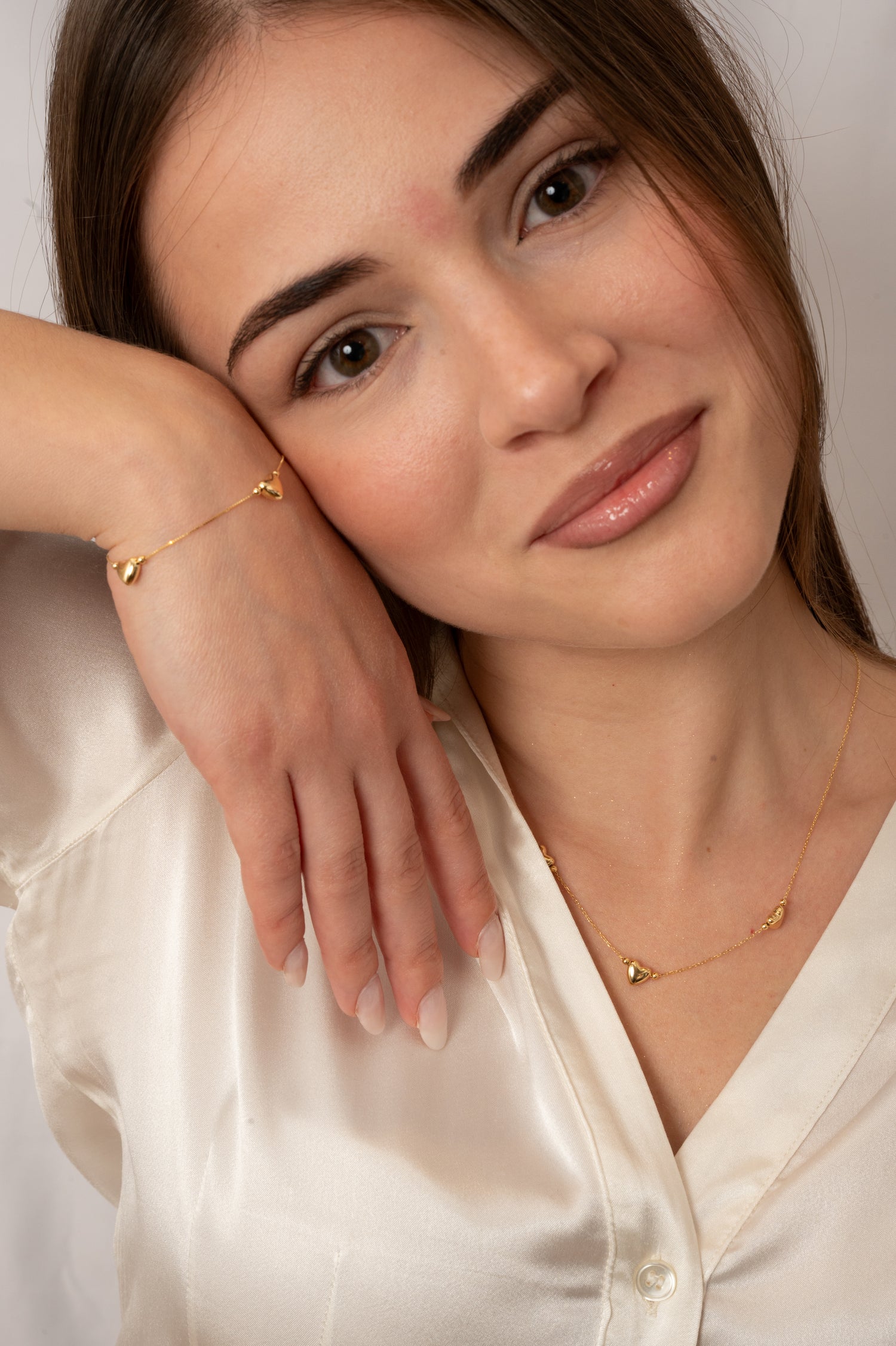 Bracciale Tris di Cuori in Oro Giallo 9 Carati Unoaerre
