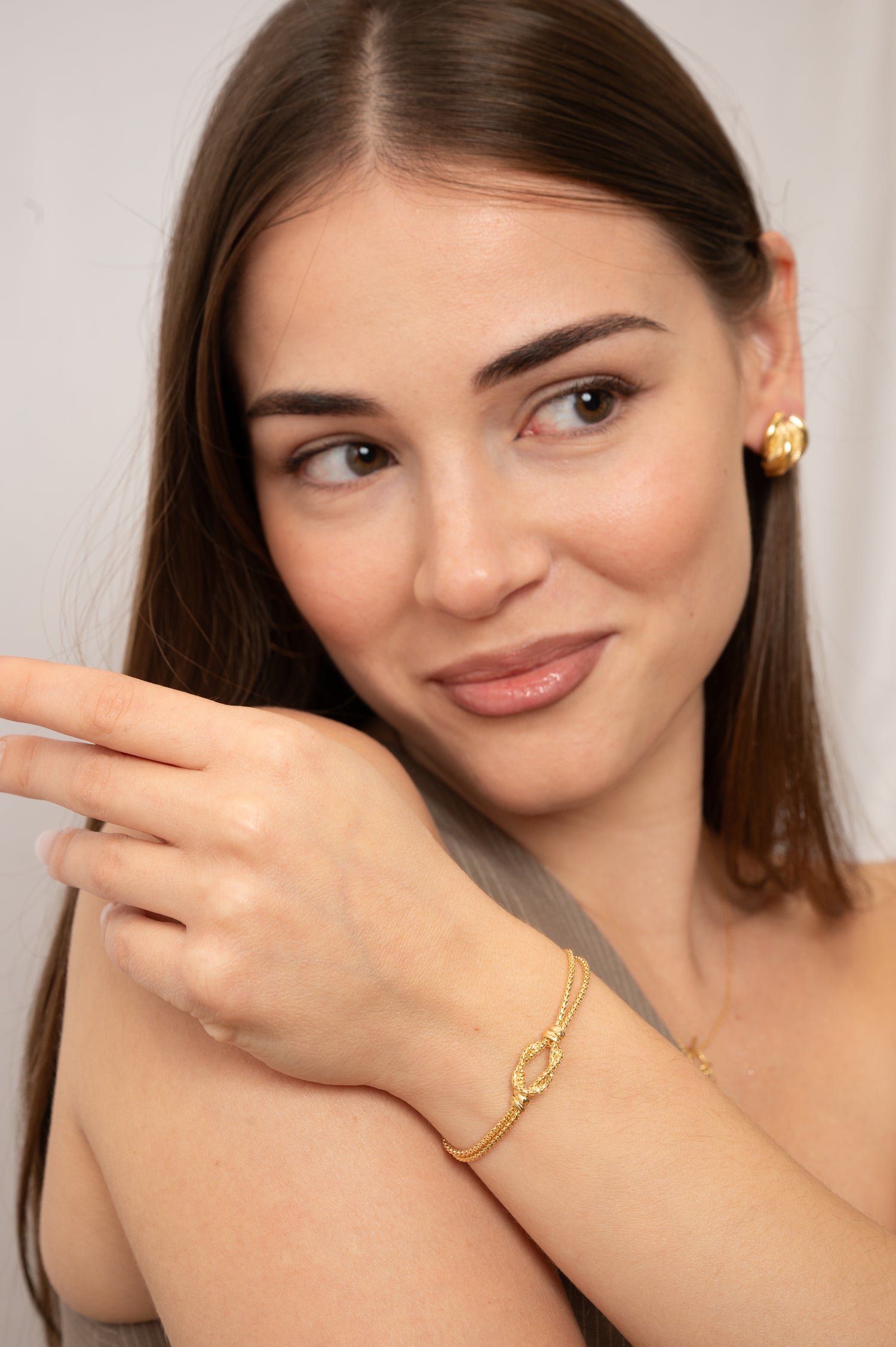 Bracciale Coreana con Nodo in Oro Giallo 9 Carati Unoaerre